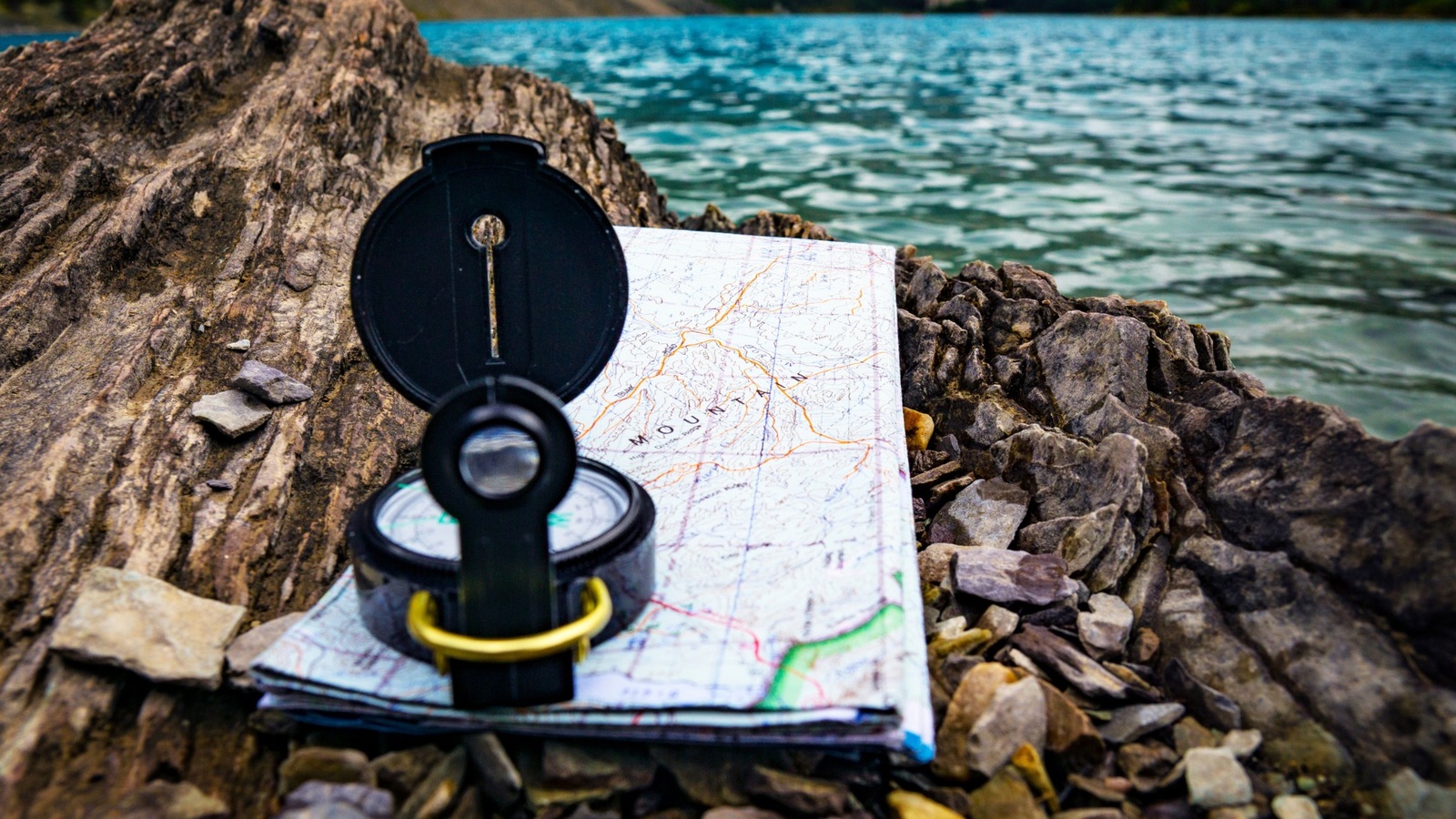 Paper map and compass for navigation